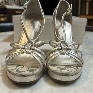 Coach Joslin Metallic wedge heels in silver.  Great condition.  Size 8.